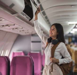 young-asian-woman-travel-by-airplane-passenger-pu-2023-11-27-04-51-50-utc